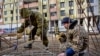 Орусия. Курулушта иштеген мигранттар. Иллюстрация үчүн колдонулган сүрөт