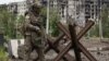 У Маріуполі спостерігається безвладдя і розгул криміналу, повідомляють журналісти місцевих видань. На фото: військовий ПВК «Вагнер» у Донецькій області (фото ілюстраційне)