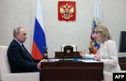 Владимир Путин жана Мария Львова-Белова.