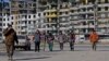 Орус бийлиги оккупацияланган Мариуполдо борборазиялык мигранттарды кармай баштады