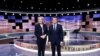 Президент Франції Емманюель Макрон (п) під час дебатів зі своєю головною опоненткою, очільницею праворадикального «Національного обʼєднання» Марін Ле Пен, 11 квітня 2022 року
