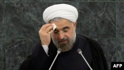Иран президенти Хасан Роухани БУУнун Башкы Ассамблеясынын 68-сессиясында сүйлөөдө.Нью-Йорк, 24-сентябрь, 2013