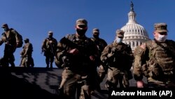 Заходи безпеки у США: Капітолій готують до інавгурації Байдена та наступного етапу щодо імпічменту Трампу (фоторепортаж)