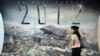 Бул жылы чыккан акыр заман темасына арналган "2012" аттуу тасма дүрбөлөңдү ого бетер күчөттү.