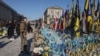 Украинцы отдают дань памяти погибшим воинам. Майдан Незалежности в Киеве, 24 февраля 2025 года. Иллюстративное фото