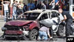 Поліцейські на місці загибелі Павла Шеремета, 20 липня 2016 року