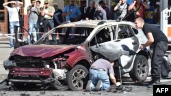 Поліцейські працюють на місці загибелі Павла Шеремета, 20 липня 2016 року