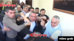 Armenia - Tigran Ter-Margarian (right), the Nor Nork district chief, and other men beat up video blogger Artur Chakhoyan, Yerevan, April 30, 2025.