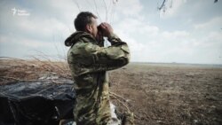 Новолуганський напрямок: на позиціях бойовиків – прапори СРСР та російських військових (відео)