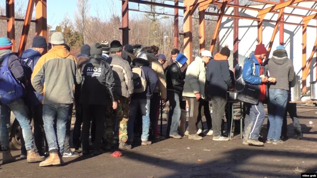 Serbia - migrants and refugees gather in an abandoned building near Sid, Serbia, near the Croatian border. roundup screen grab